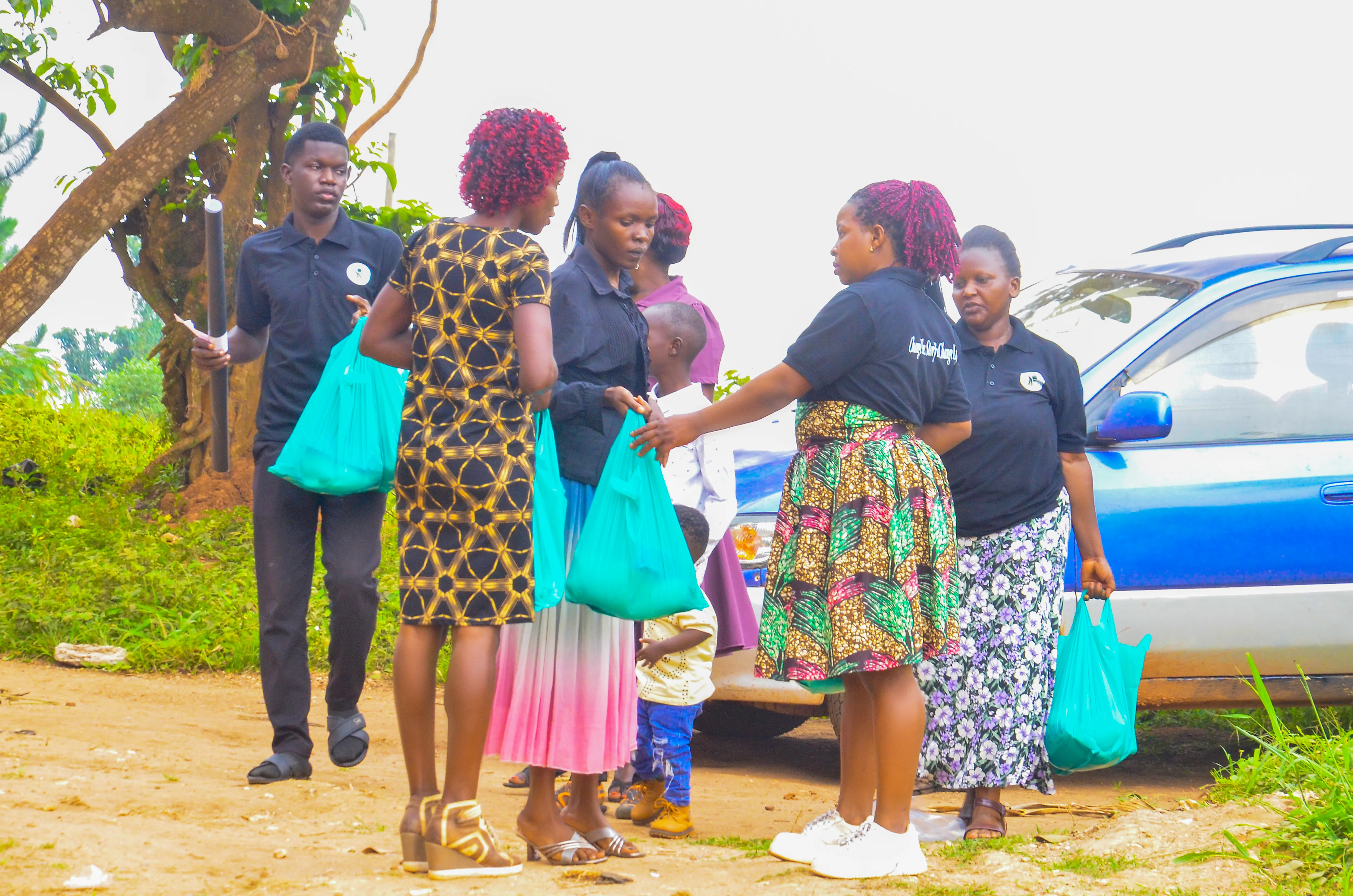 Volunteers distributing food parcels