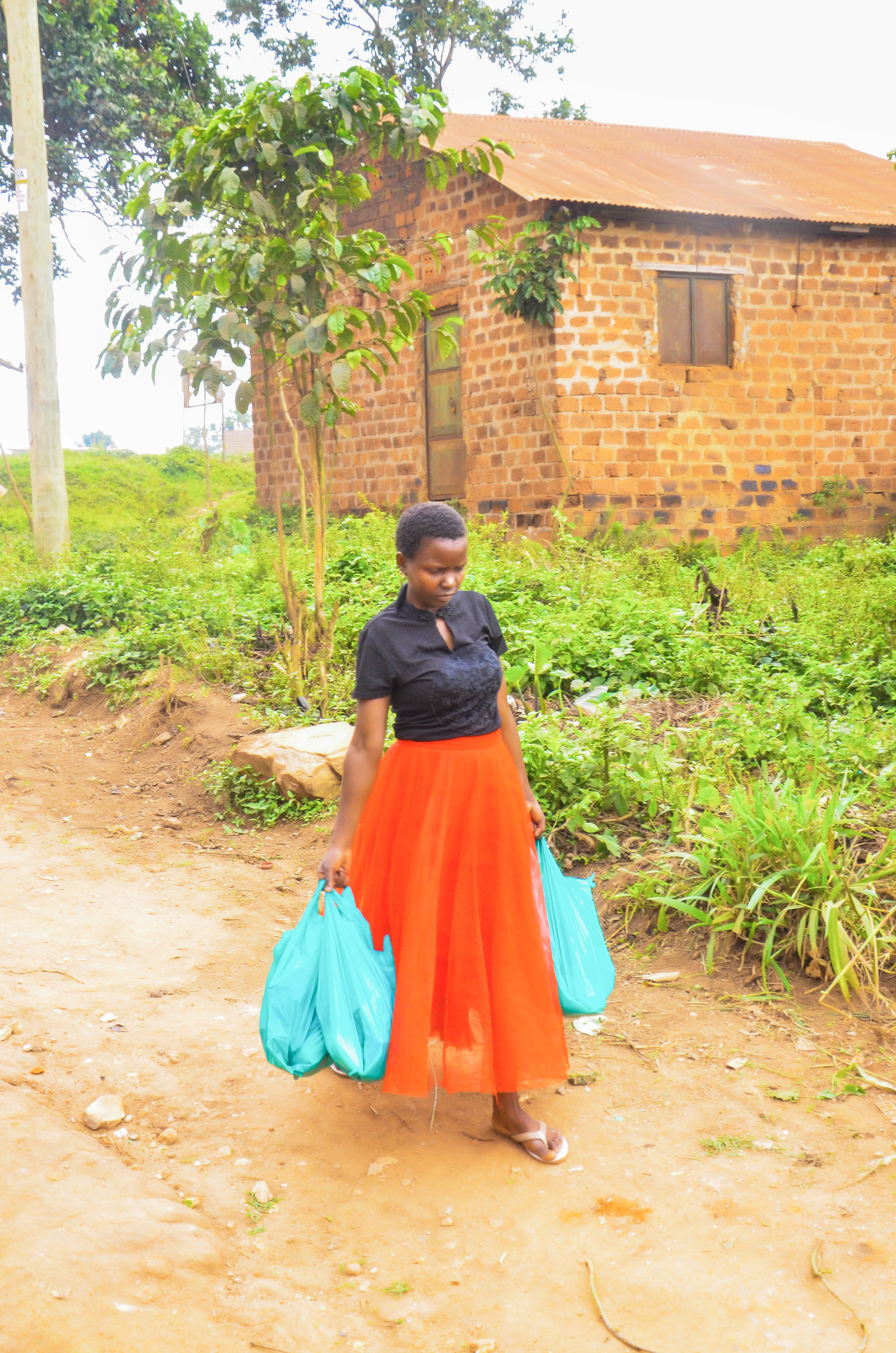 A volunteer delivering hygiene supplies